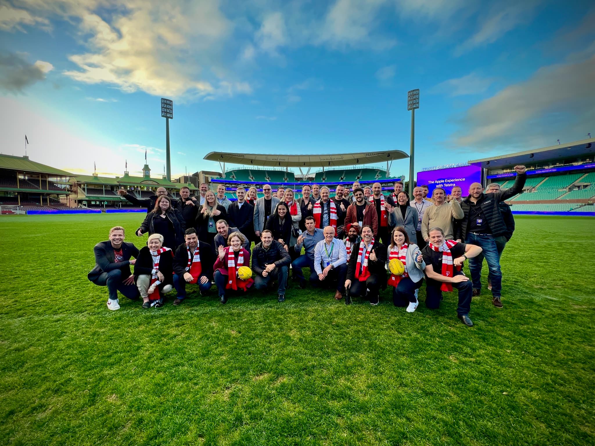 The Apple Experience with Telstra participants gathered on the field at the Sydney Cricket Ground.